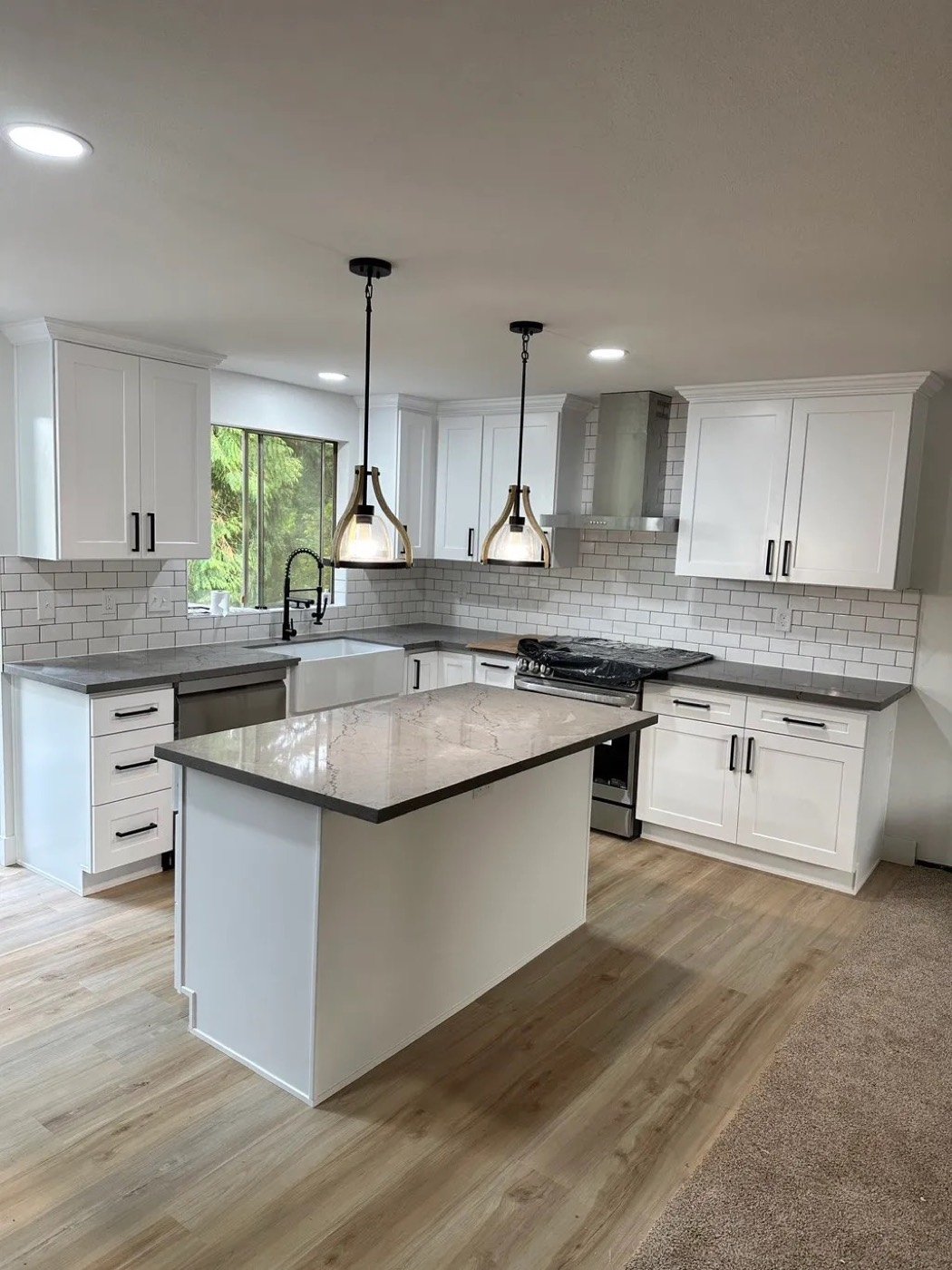 Kitchen with white subway tile backsplash